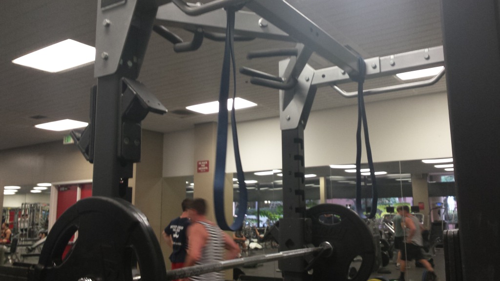 Here's how the bands should be attached to the rack for a reverse-band back squat.